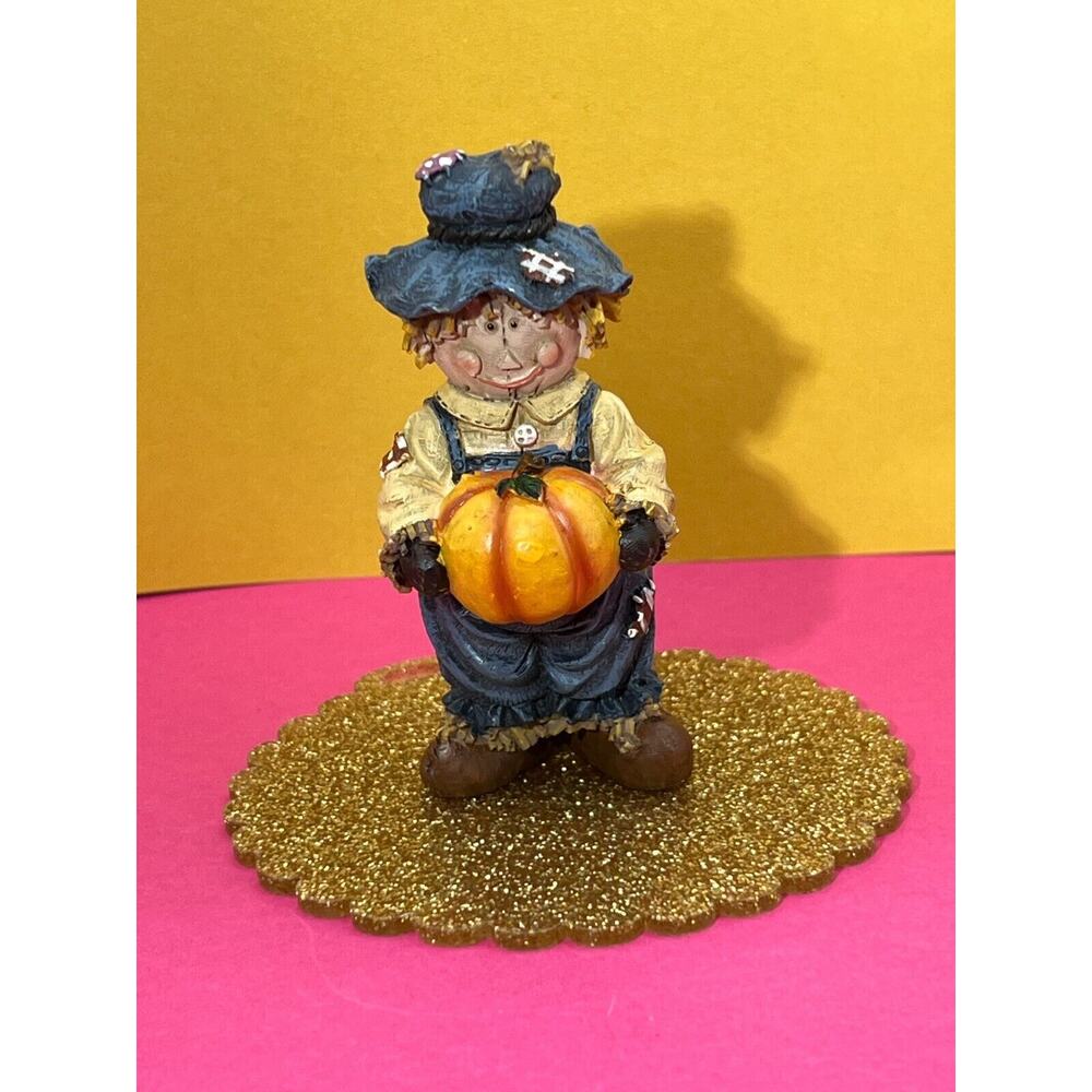 Scarecrow Holding Pumpkin Young's China figurine